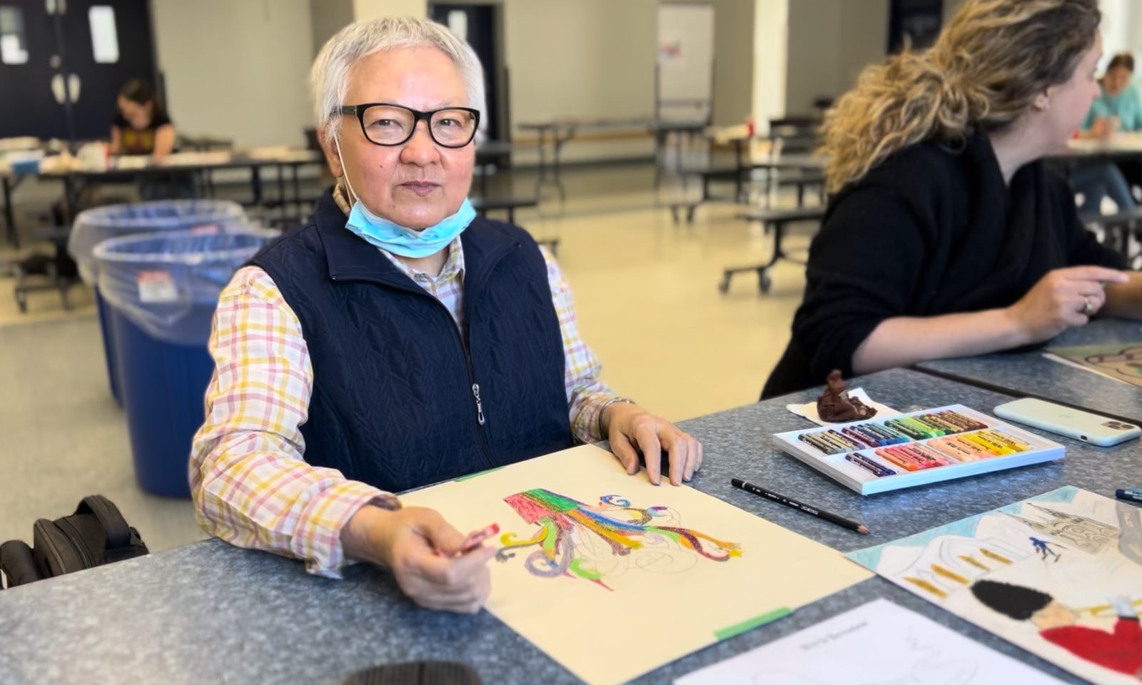 A participant drawing one of the stories