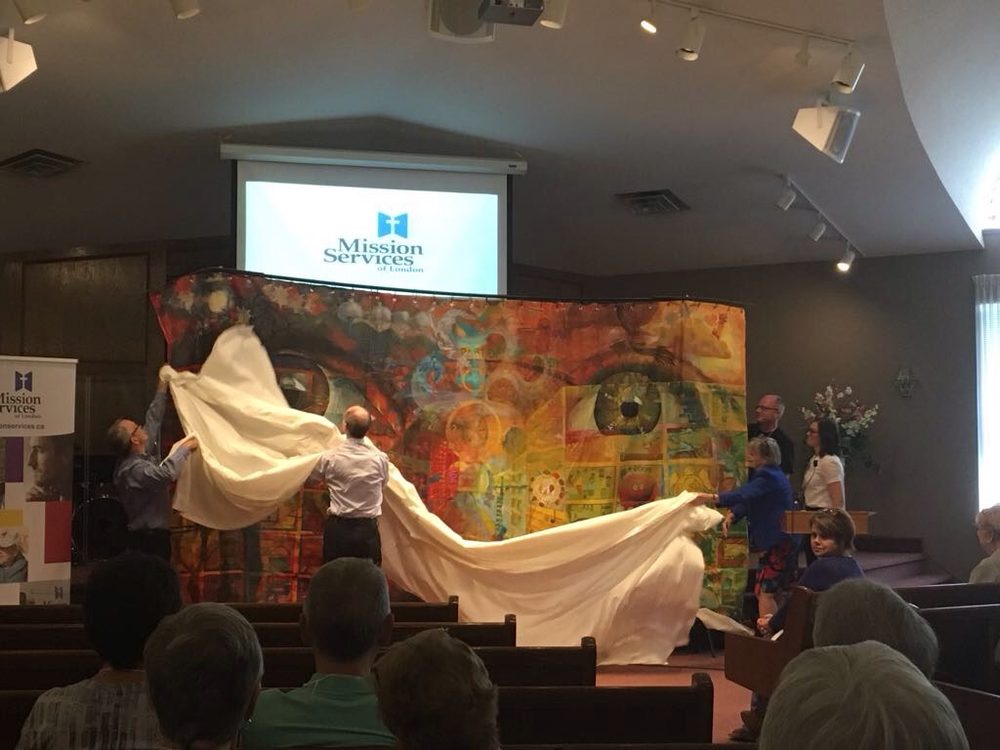 The painting presented to an audience